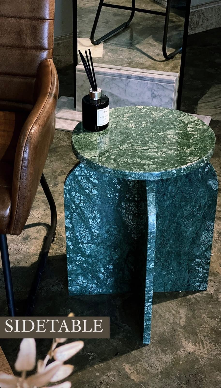 Green marble side table with book-matched veining