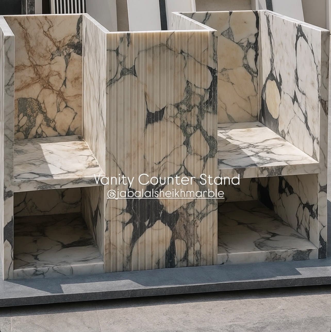 Vanity counter stand cut from dramatic Calacatta Viola marble