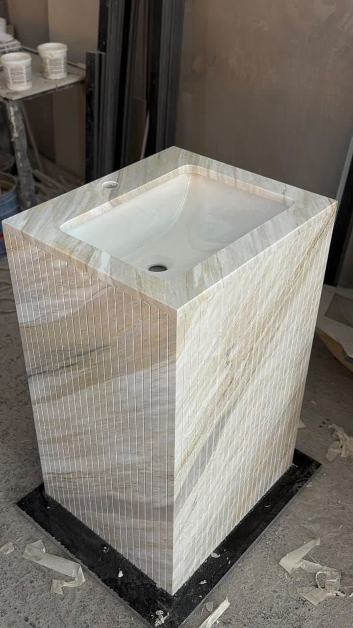 Fluted travertine cube pedestal sink, fresh from fabrication