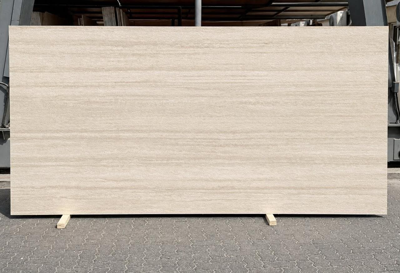 Sintered stone slab, cream linear finish, studio shot