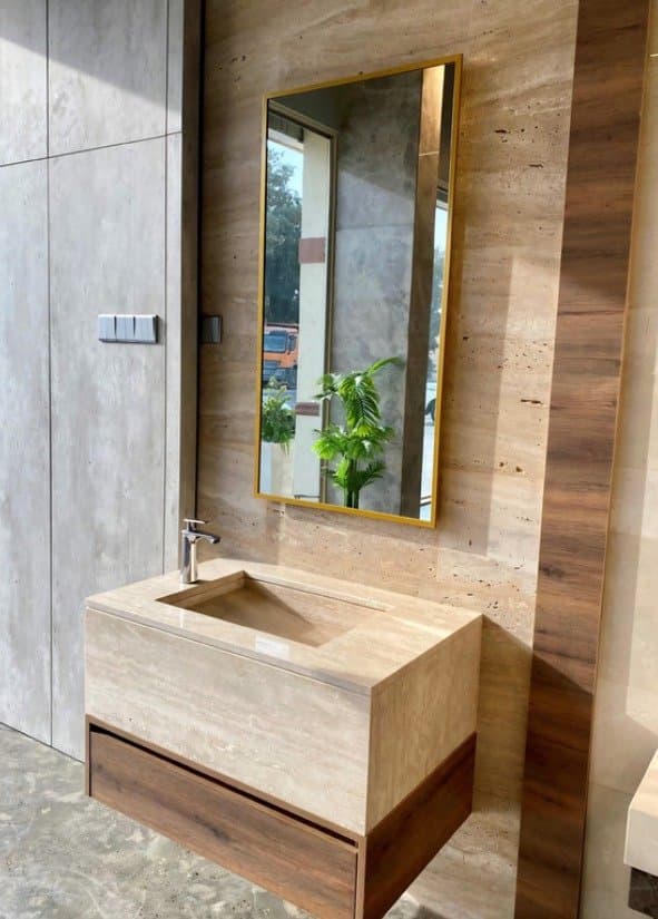 Travertine vanity with backlit mirror
