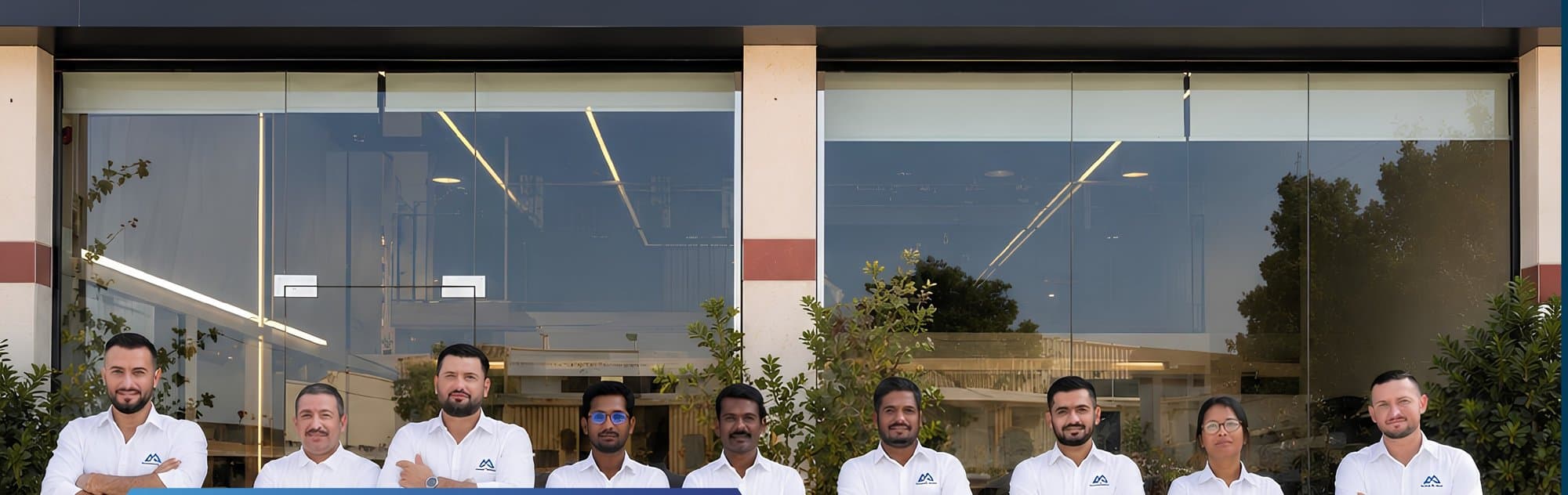 The Jabal Al-Sheikh Marble team outside the showroom